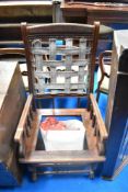 A Victorian mahogany American rocker, in need of restoration