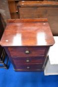 A vintage small chest of three drawers, height approx 82cm, width 61cm.