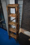 A set of vintage wooden step ladders