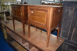 A pair of Edwardian mahogany bedside cabinets