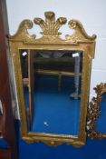 A traditionally styled wall mirror, having gilt frame, approx 102cm high by 54cm wide.