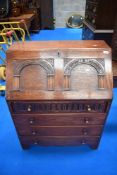 A vintage Priory style bureau in oak