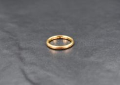 A 22ct gold wedding band, ring size I-J, 3.5g