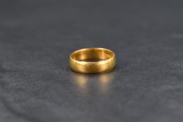 A 22ct gold wedding band, ring size N, 3.8g