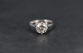A diamond solitaire ring, the stone being brilliant cut and approx 1.4ct, in an eight claw set mount