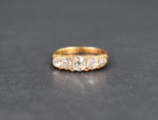A graduated five stone diamond ring having five old cut diamonds, total approx 1.2ct with diamond