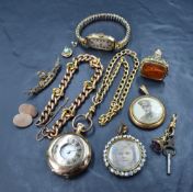 A leather bound trinket box containing a selection of rolled gold jewellery including small half