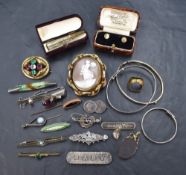 A small selection of silver, white metal and pinchbeck jewellery including collar studs, brooches,