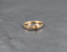 A 9ct gold band ring modelled as a buckled belt, size L & approx 1g