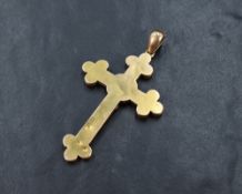 A large yellow metal cross pendant, no chain and bearing some dents, no marks, approx 60mm long &