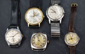 An assortment of vintage wristwatches, comprising a gold plated Tissot Automatic Seastar Seven, a