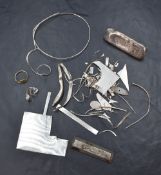 A small quantity of scrap silver including mainly jewellery makers pieces of sheet silver and melted