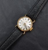 A lady's vintage 9ct gold Omega manual wrist watch, movement no: 20432729, having a baton numeral