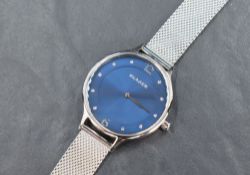 A lady's Skagen quartz wrist watch model SKW2307 having a diamante dot dial on a blue face in a