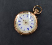 A small continental gold top wound pocket watch stamped 14K having blue Roman numeral dial with gilt