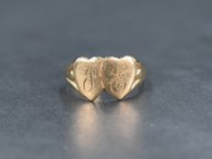A 9ct gold double heart signet ring bearing monogram JE, size N & approx 3.2g