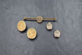 Two pairs of cameo button collar studs in white and rose metal both depicting a lady in profile,