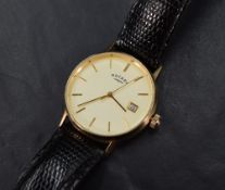 A gent's 9ct gold Rotary quartz wrist watch having a baton numeral dial with date aperture on a