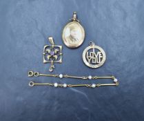 A group of 9ct gold and yellow metal jewellery, comprising a yellow metal open face locket marked