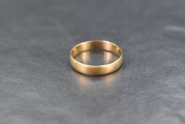 An 18ct gold wedding band, ring size R-S, 2.5g
