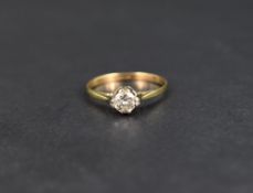 A diamond solitaire ring, the round cut diamond measuring approximately 0.40ct in a raised four
