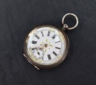 A small silver key wound, open face pocket watch, the white dial with Roman numerals, subsidiary