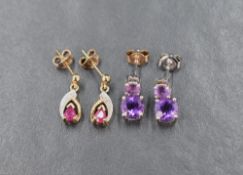 Two pairs of 9ct gold drop earrings, comprising a pair of yellow gold ruby and diamond earrings