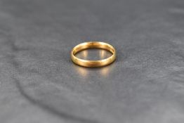 A 22ct gold wedding band of plain form, size K & approx 2.5g