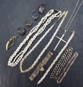 An assortment of silver jewellery comprising a silver hinge bangle with decorative engraving, a