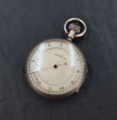 An early 20th Century silver pedometer having a 12 mile dial to silvered face in an engine turned