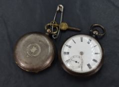 A Victorian silver open face key wound pocket watch, the white dial having Roman numerals and
