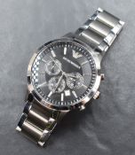 An Emporio Armani chronograph wristwatch, the black dial with baton markers, three subsidiary
