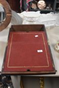 A Remy Martin Cognac travelling writing slope.