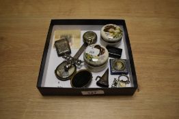 A collection of trinkets including a portrait miniature, a veta case, tiny snuffbox and candle