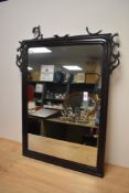 A late 19th century mahogany fretwork wall mirror with reeded molding, damage to fretwork pieces