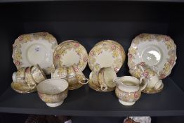 A collection of early 20th Century Collingwood china teaware, decorated in a foliate design