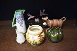 A collection of assorted glass ware and pottery including a small Belleek jug, a pretty vase