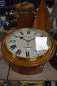 ** Local Interest** An oak cased station clock made by Dinsdale Carlisle of Kendal with Roman