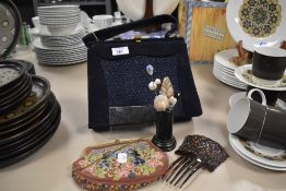 A vintage blue handbag with lace work insert, a tapestry purse with gilt metal clasp, a hair comb in