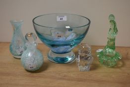 A 20th Century Caithness tinted blue glass centre bowl, having a magnolia flower design to the base,