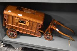 A 20th Century hand crafted model of a traveller's cart, measuring 65cm long in total