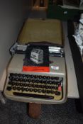 A vintage Olivetti typewriter model lettera 22 in original case.