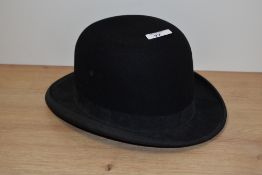 A vintage bowler hat by The Atlas Brand, circumference 53cm
