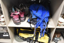 A large amount of high altitude climbing/mountaineering gear to include boots, rucksacks,