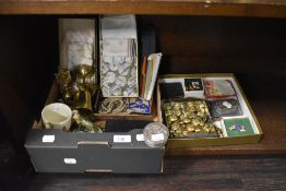 A miscellaneous collection of items including a tin of military brass buttons, a vintage childs