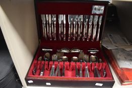 An Oneida canteen of cutlery (88 pieces approx) in mahogany style case.