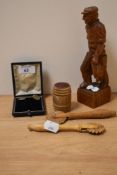 A 20th Century folk art style study of a fisherman and his catch, measuring 20cm tall, two pastry