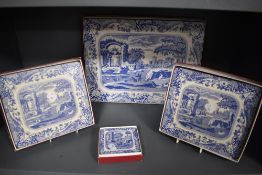 A group of boxed blue and white Italian pattern coasters and place mats