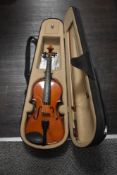 A modern violin, labelled Max Bruch Stradivarius copy, with case and bow
