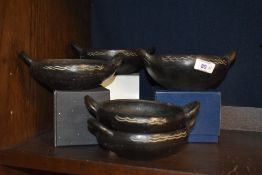 Five Hellenistic style wooden bowls of varying sizes, the largest having a diameter of 14cm